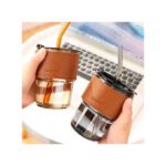 Tass d'eau et café avec pipette